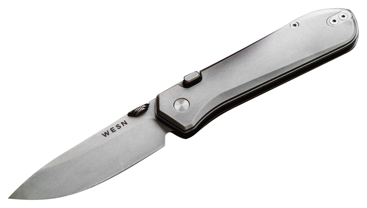 The WESN BOK in titanium, open, cut out on a transparent background
